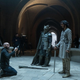 Lowery, Ineson, and Patel on the set of The Green Knight.